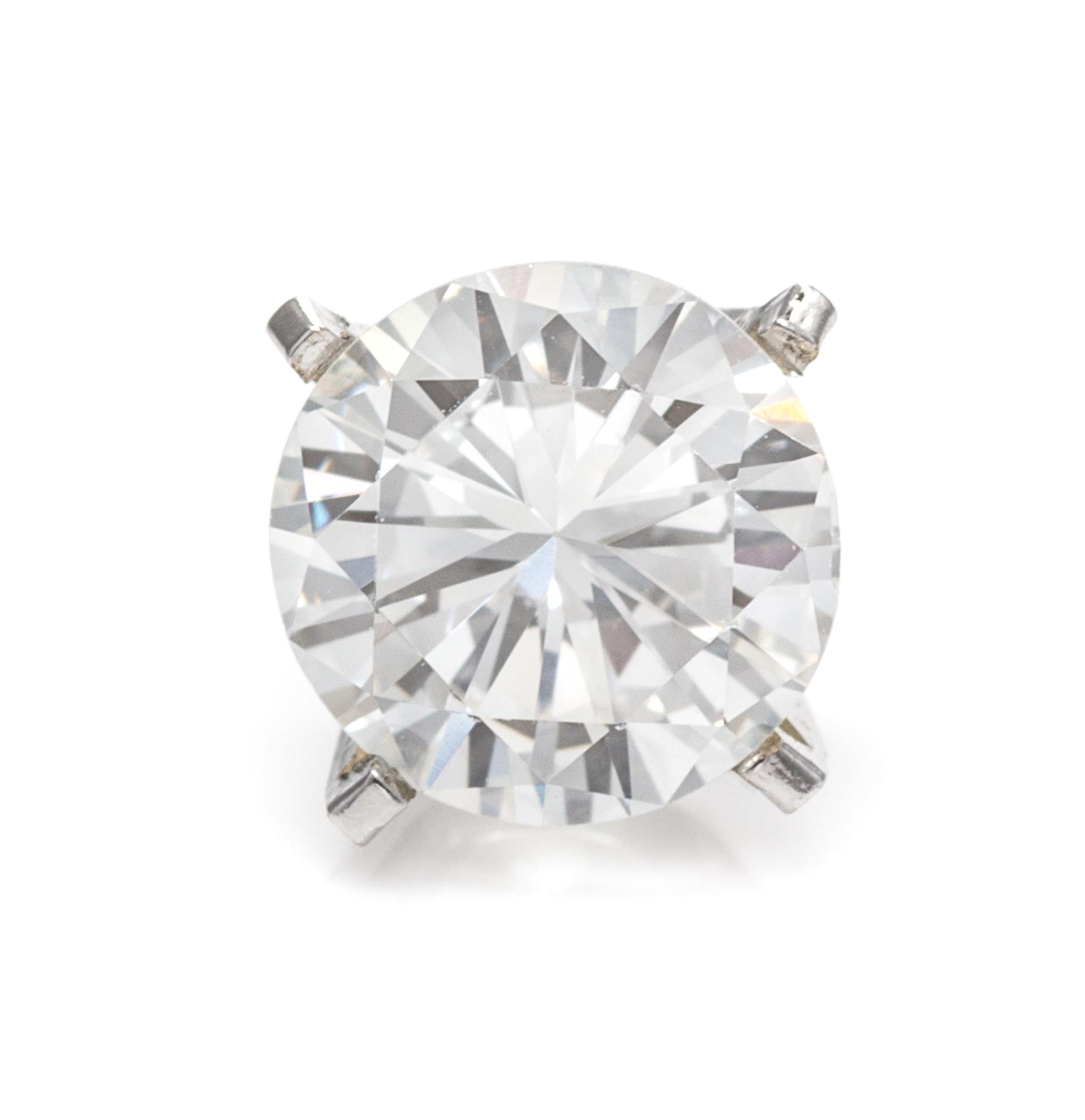 A White Gold and Diamond Stud Earring, 0.50 dwts.