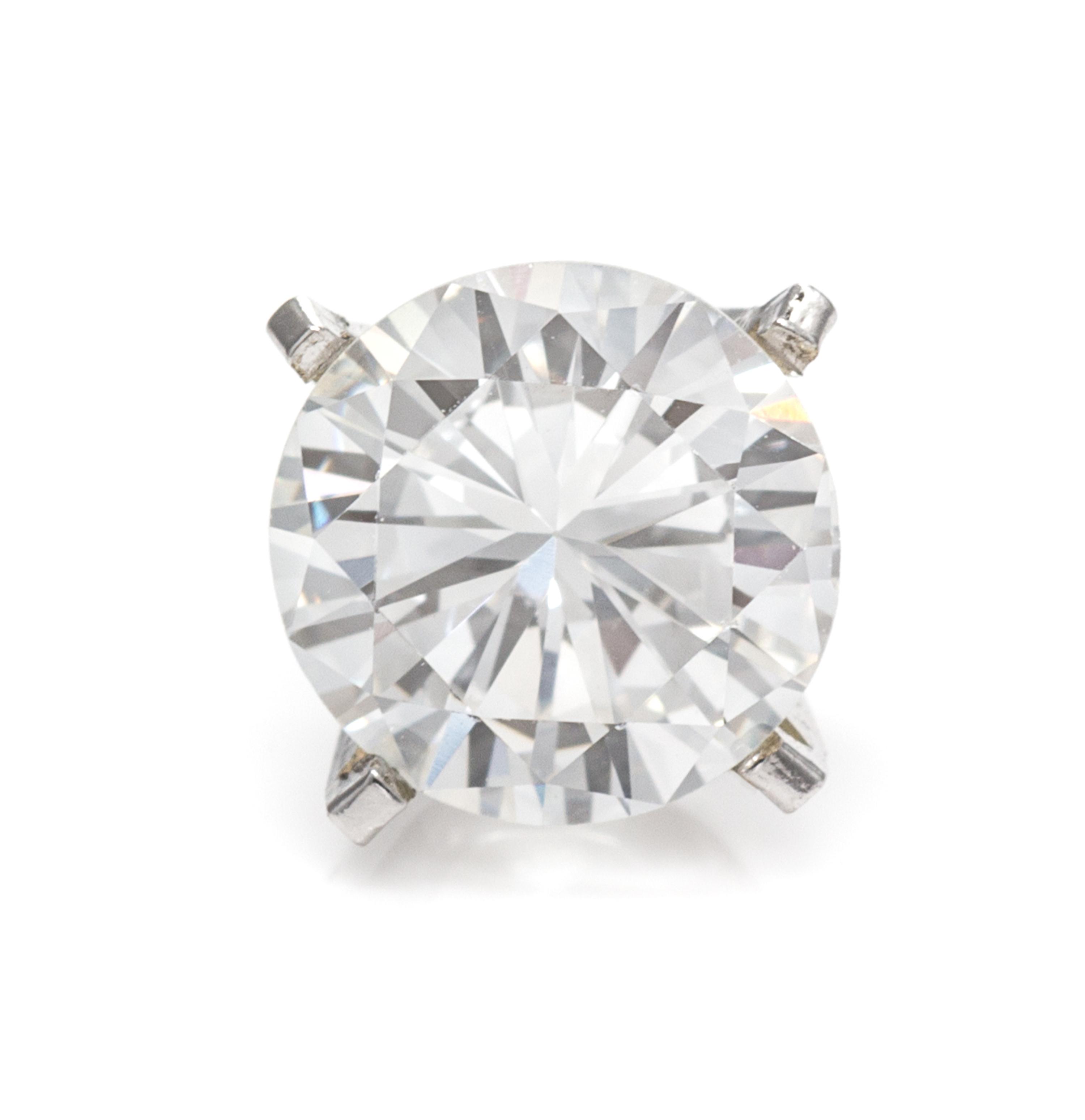 A White Gold and Diamond Stud Earring, 0.50 dwts.