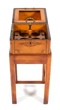 A Charles X Style Birds-Eye Maple Liqueur Chest on Stand Height 29 1/2 x width 12 3/4 x depth 12 3/4 inches. — 19TH CENTURY