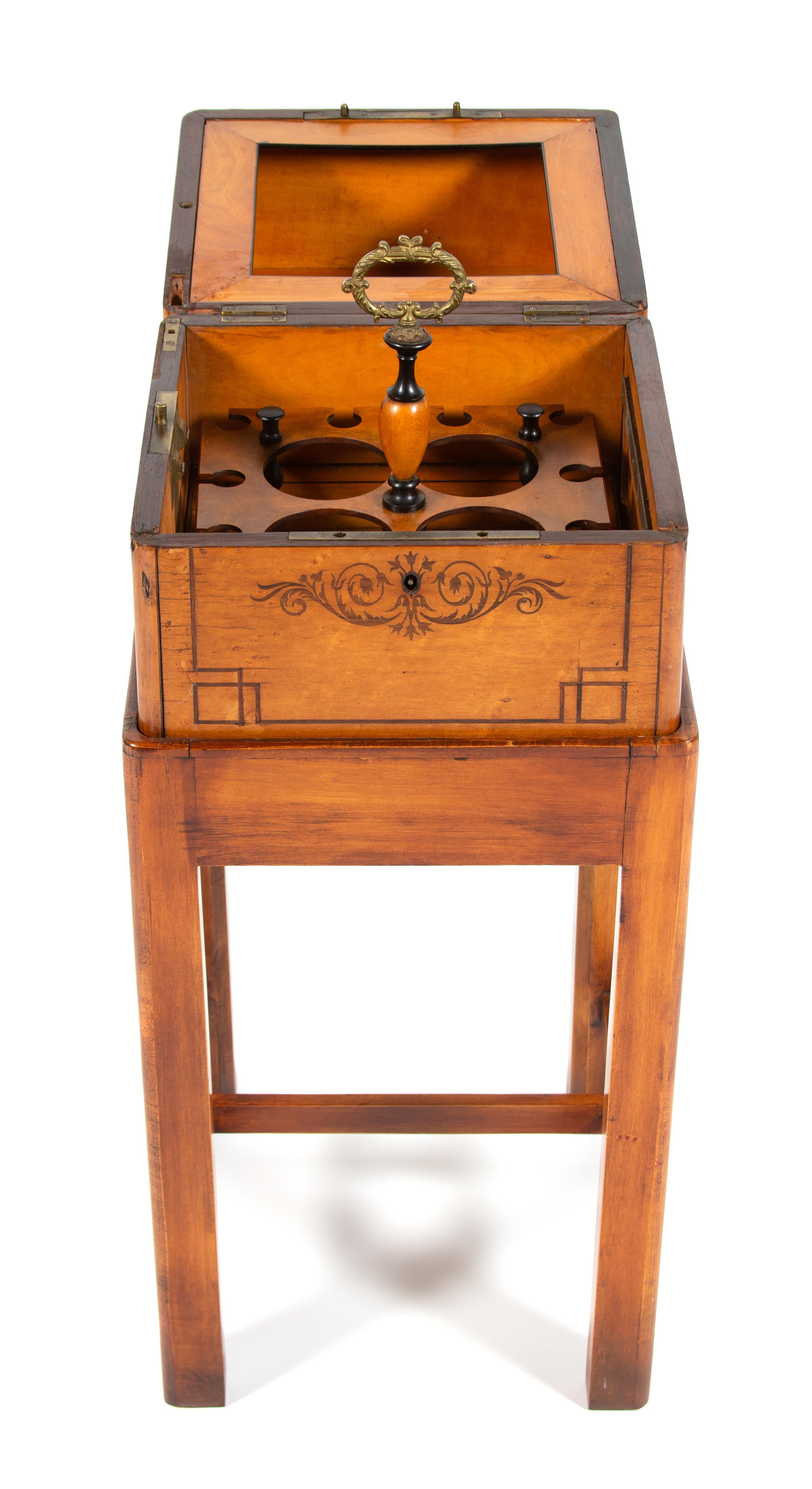 A Charles X Style Birds-Eye Maple Liqueur Chest on Stand Height 29 1/2 x width 12 3/4 x depth 12 3/4 inches. — 19TH CENTURY