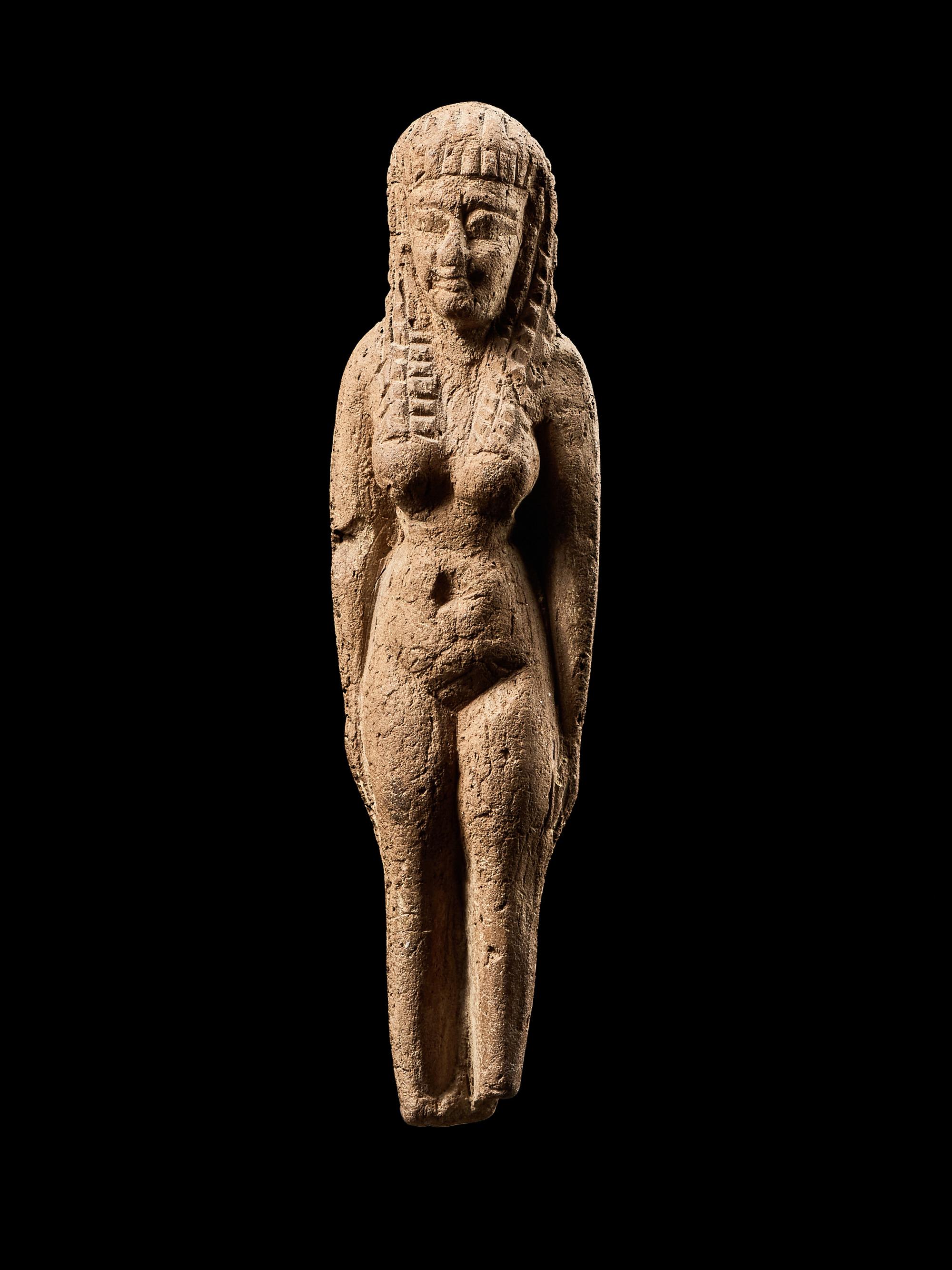 An Egyptian Terracotta Female Figure