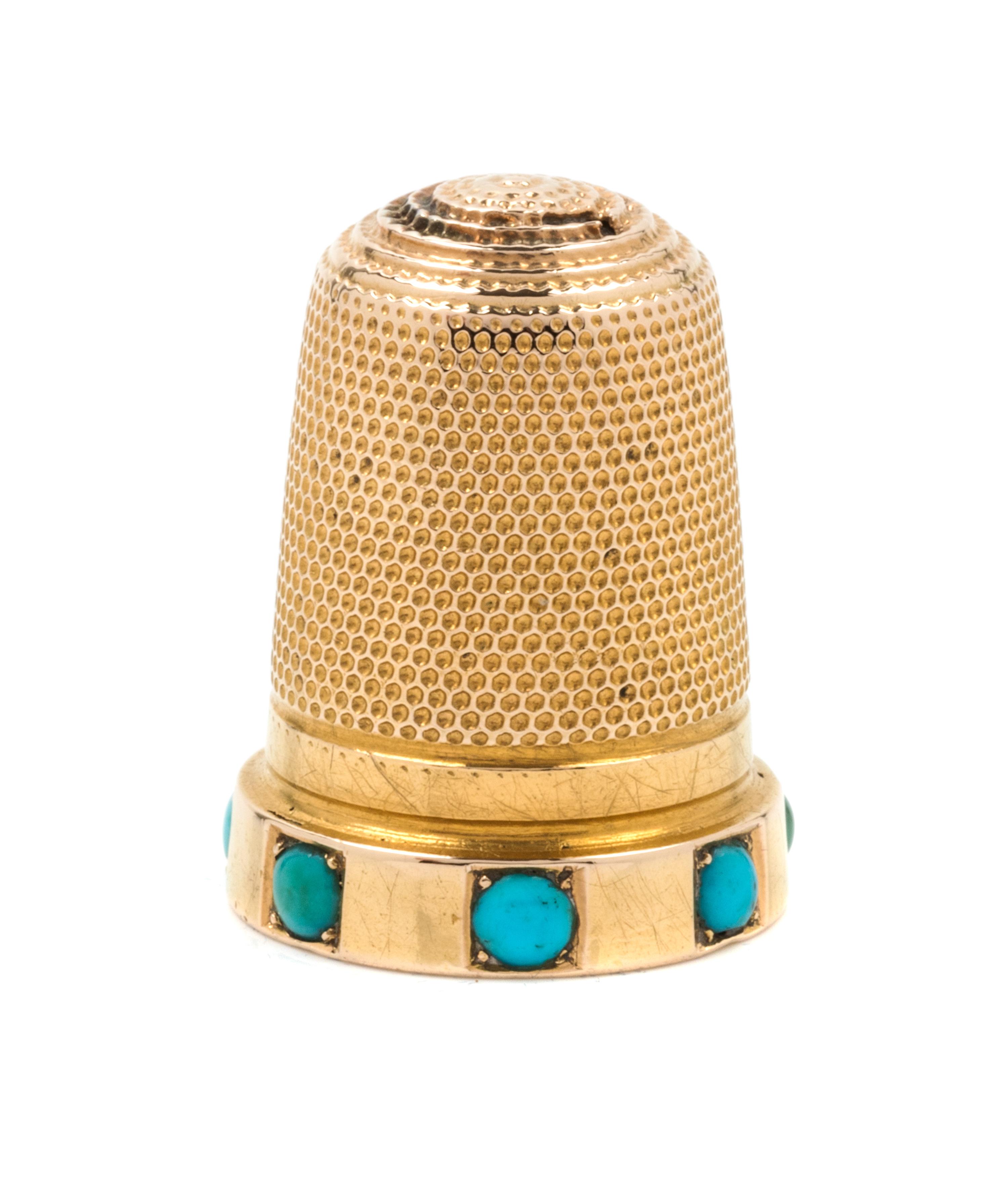 A Yellow Gold and Turquoise Thimble, , the knurled top and body above the base inset with turquoise cabochons.