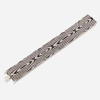 A white gold, diamond, and enamel bracelet