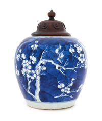 A Chinese Blue and White Porcelain "Crackled Ice and Prunus" Ginger Jar Height 6 1/4 inches. — 19TH CENTURY