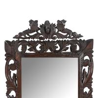 An Italian Carved Oak Mirror