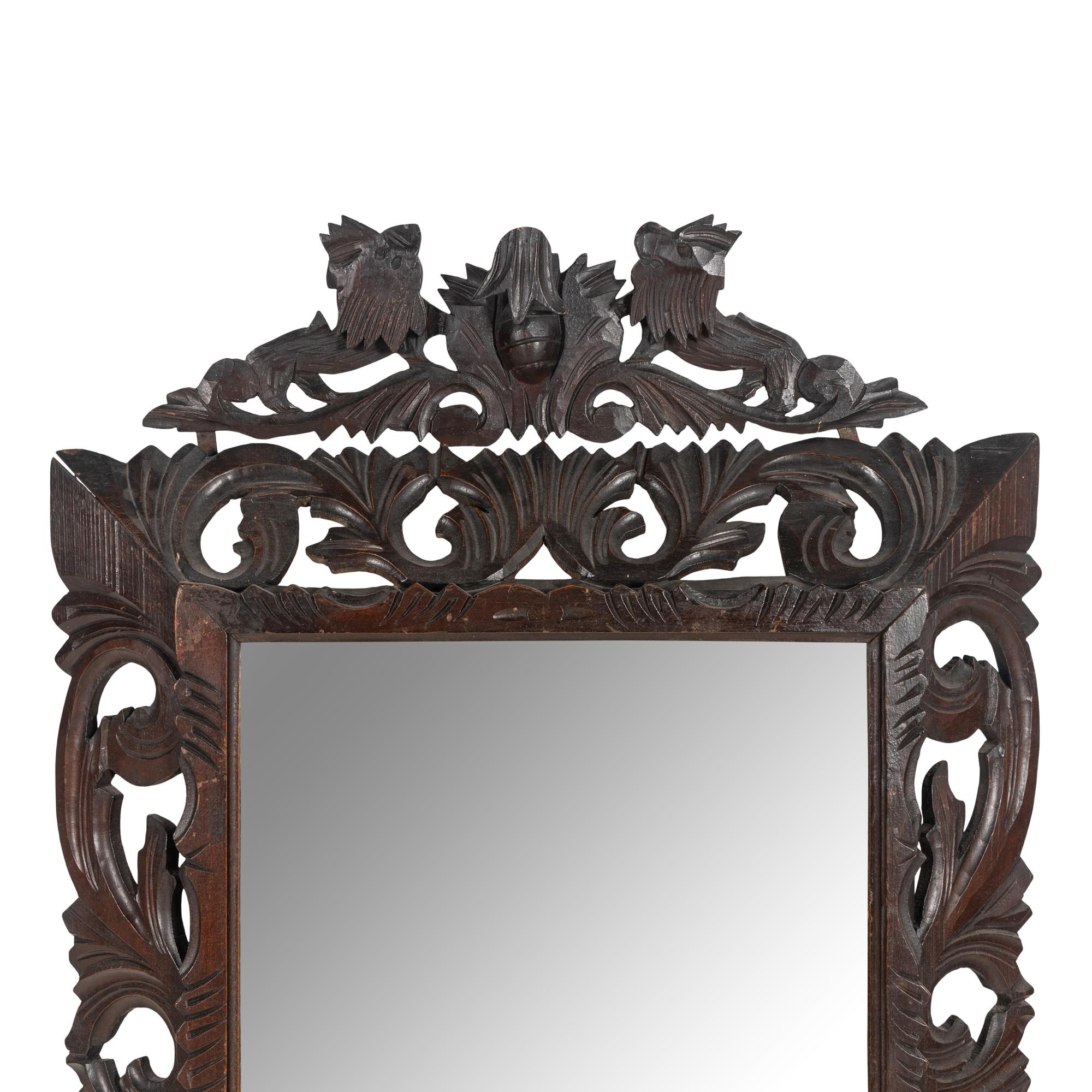 An Italian Carved Oak Mirror