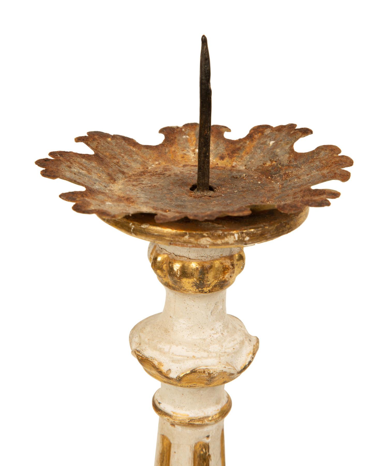 Two Pairs of Tuscan Painted and Parcel Gilt Candlesticks — 17TH CENTURY