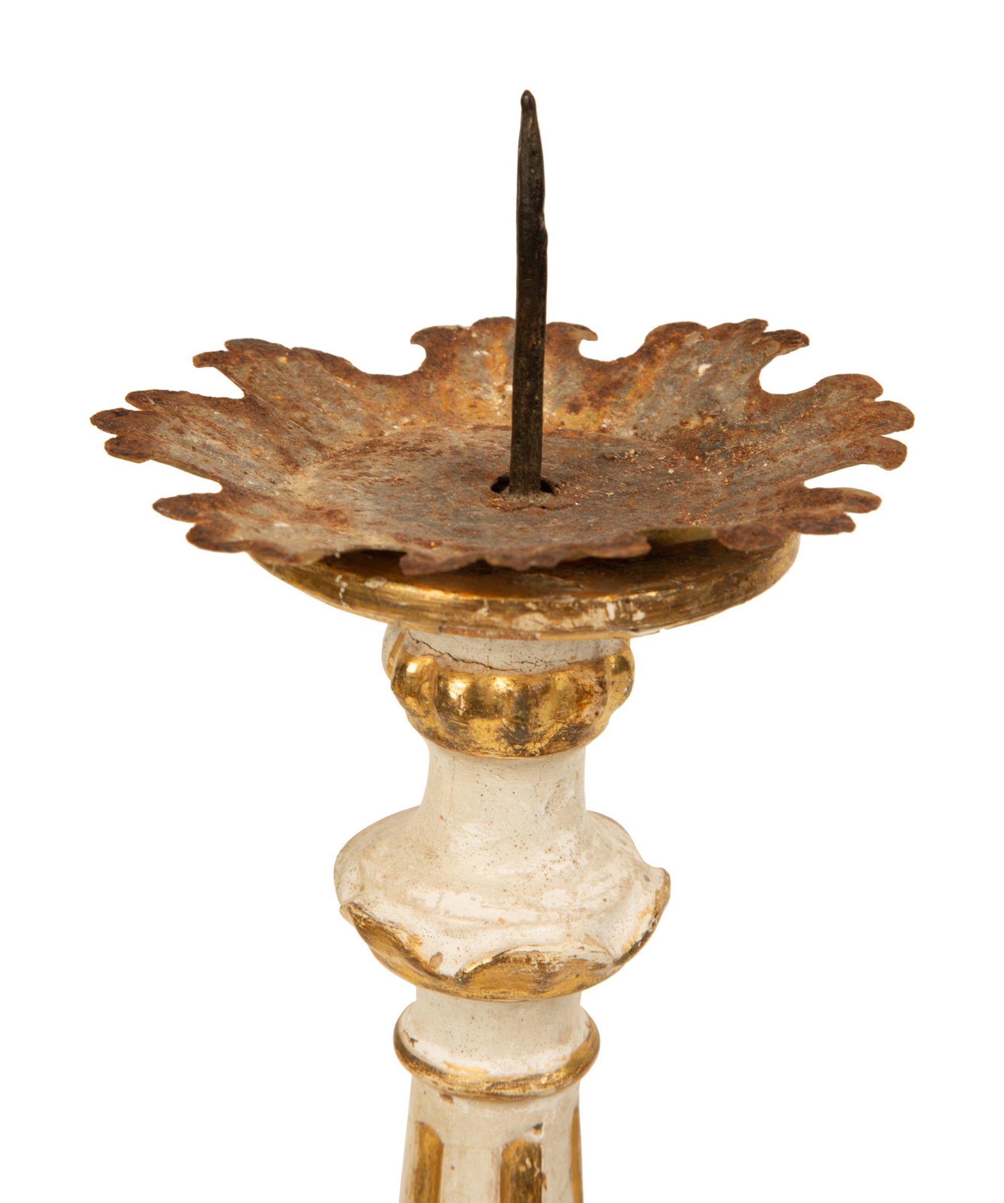 Two Pairs of Tuscan Painted and Parcel Gilt Candlesticks — 17TH CENTURY