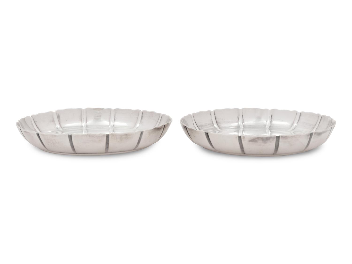 A Pair of Edwardian Silver Coin-Inset Dishes