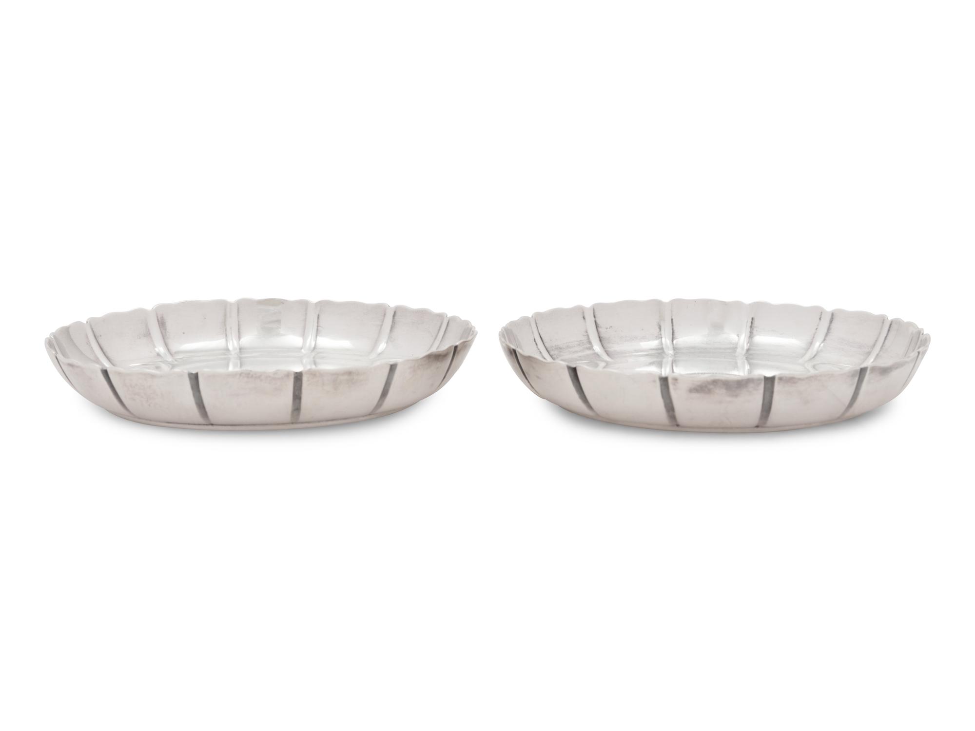 A Pair of Edwardian Silver Coin-Inset Dishes