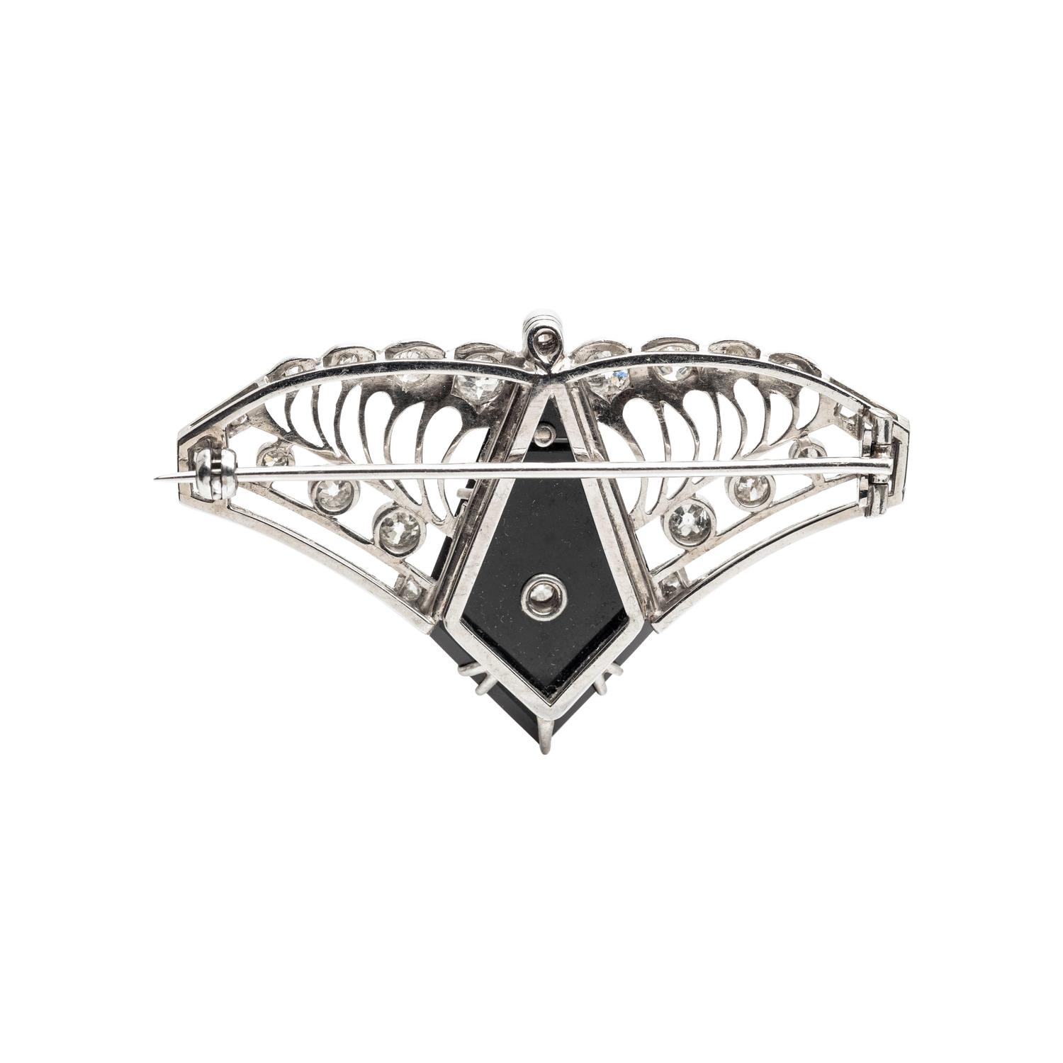 ANTIQUE, PLATINUM DIAMOND AND ONYX BROOCH