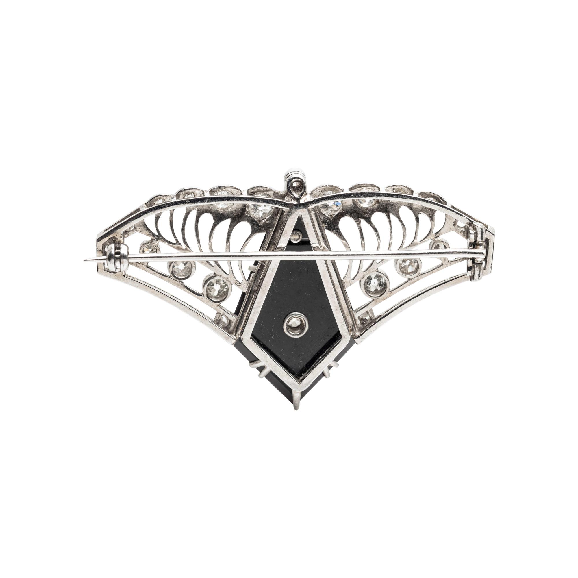ANTIQUE, PLATINUM DIAMOND AND ONYX BROOCH