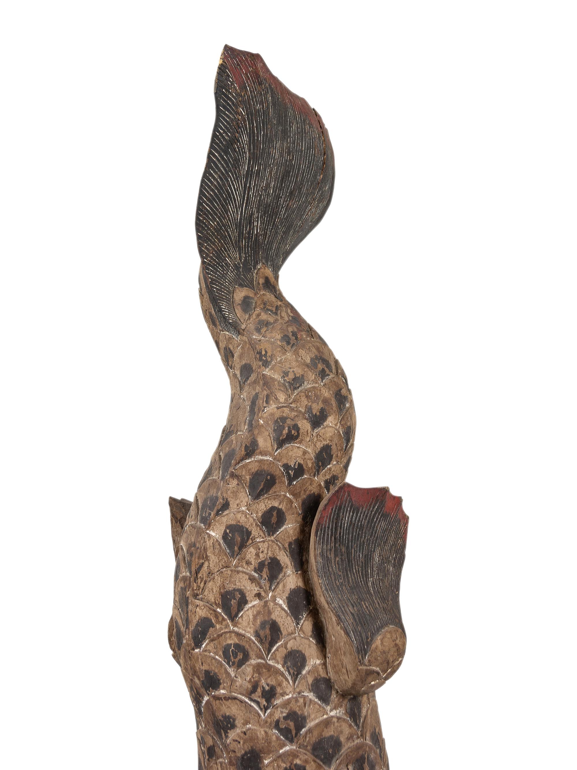 A Pair of Large Balinese Carved and Polychrome Decorated Models of Hippocampi