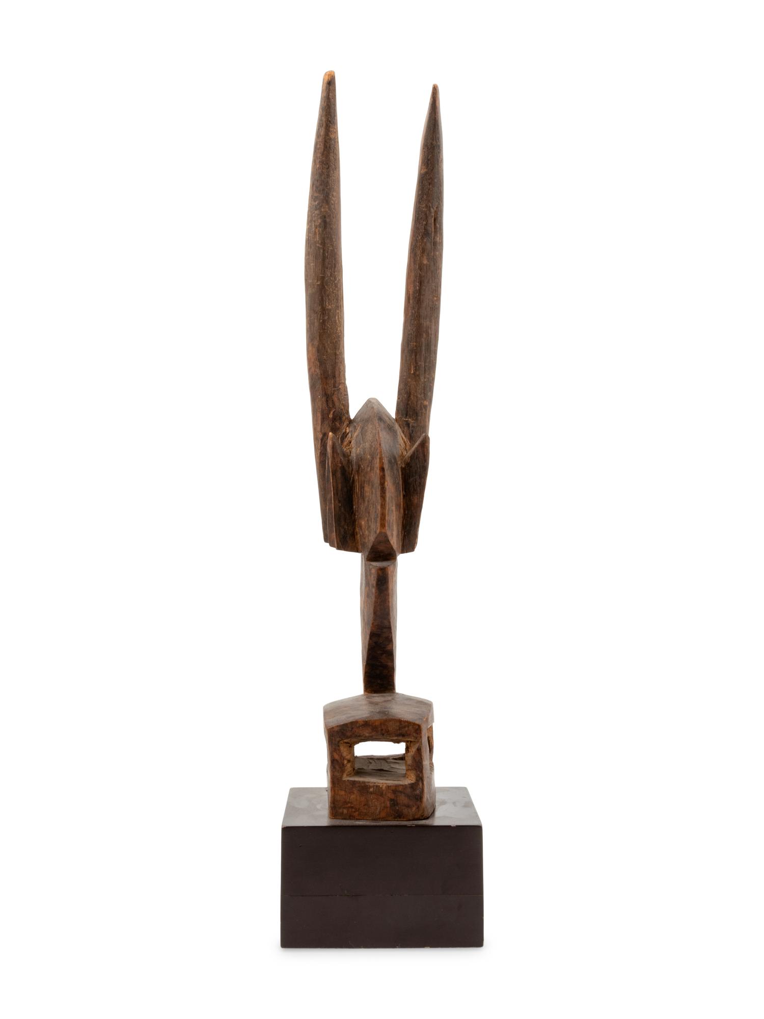 A Bambara Carved Wood Antelope Sculpture