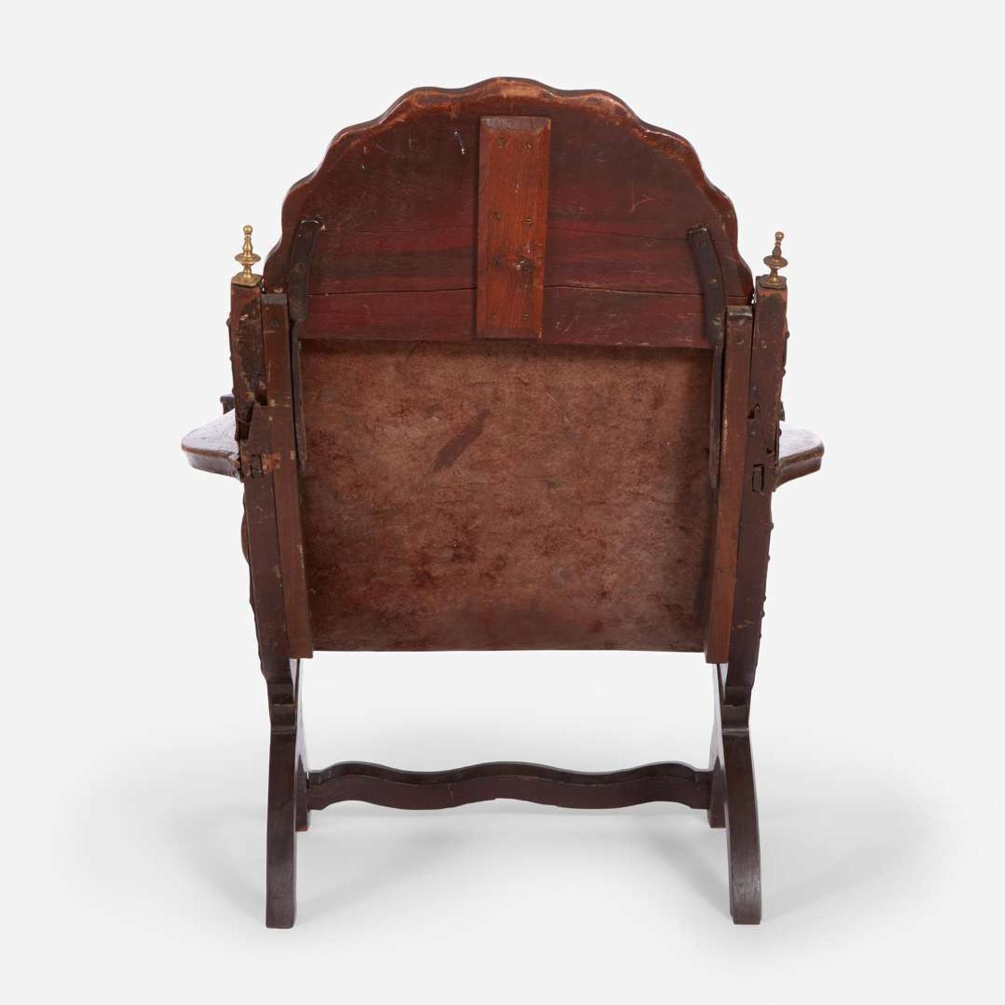 A carved mahogany and tooled leather Campeche chair Mexico, late 18th / early 19th century
