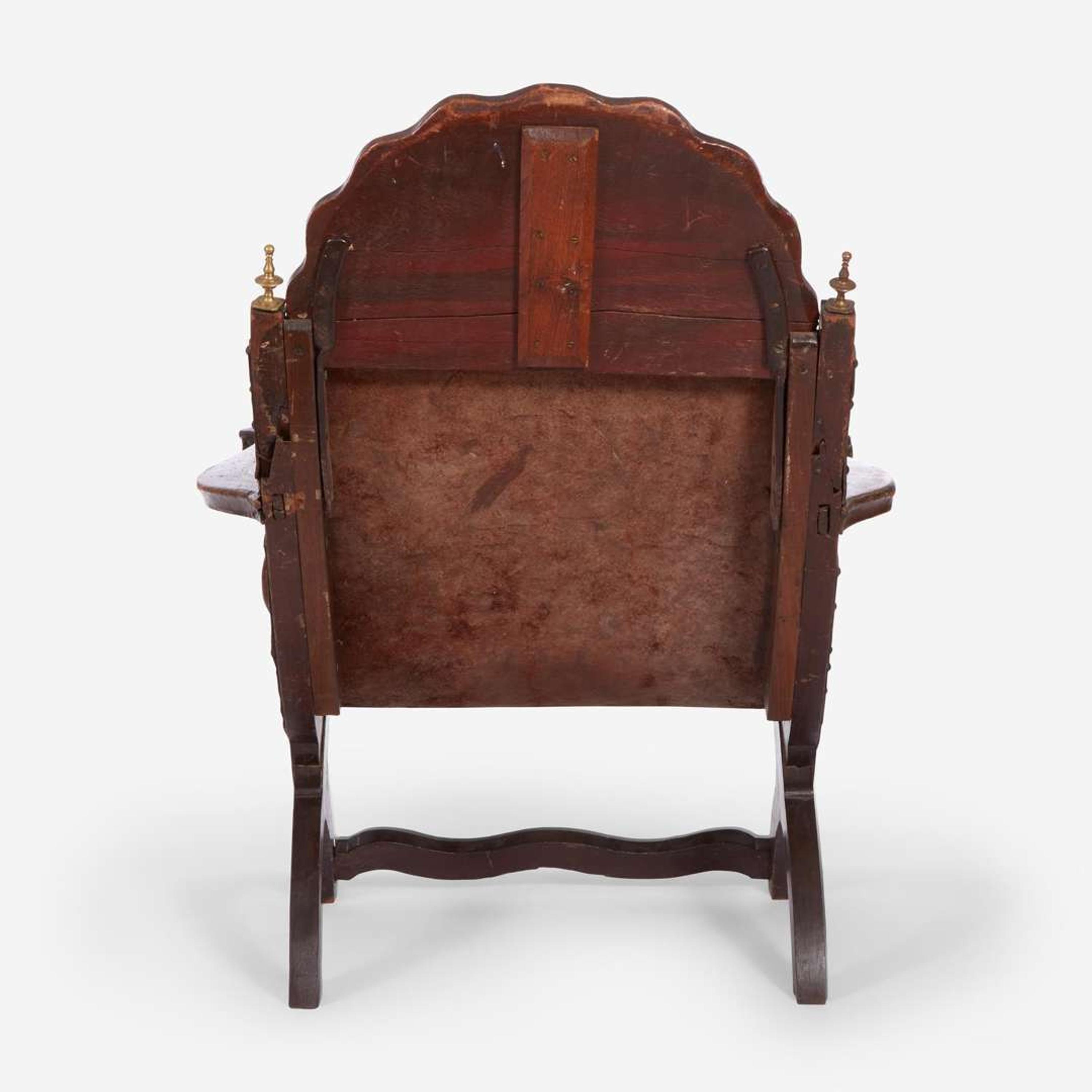 A carved mahogany and tooled leather Campeche chair Mexico, late 18th / early 19th century
