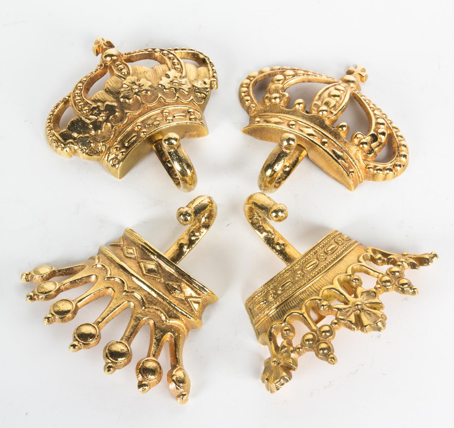A Set of Four Crown-Shaped Wall Hooks Dimensions of widest 5 1/2 inches. — 20TH CENTURY