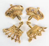 A Set of Four Crown-Shaped Wall Hooks Dimensions of widest 5 1/2 inches. — 20TH CENTURY