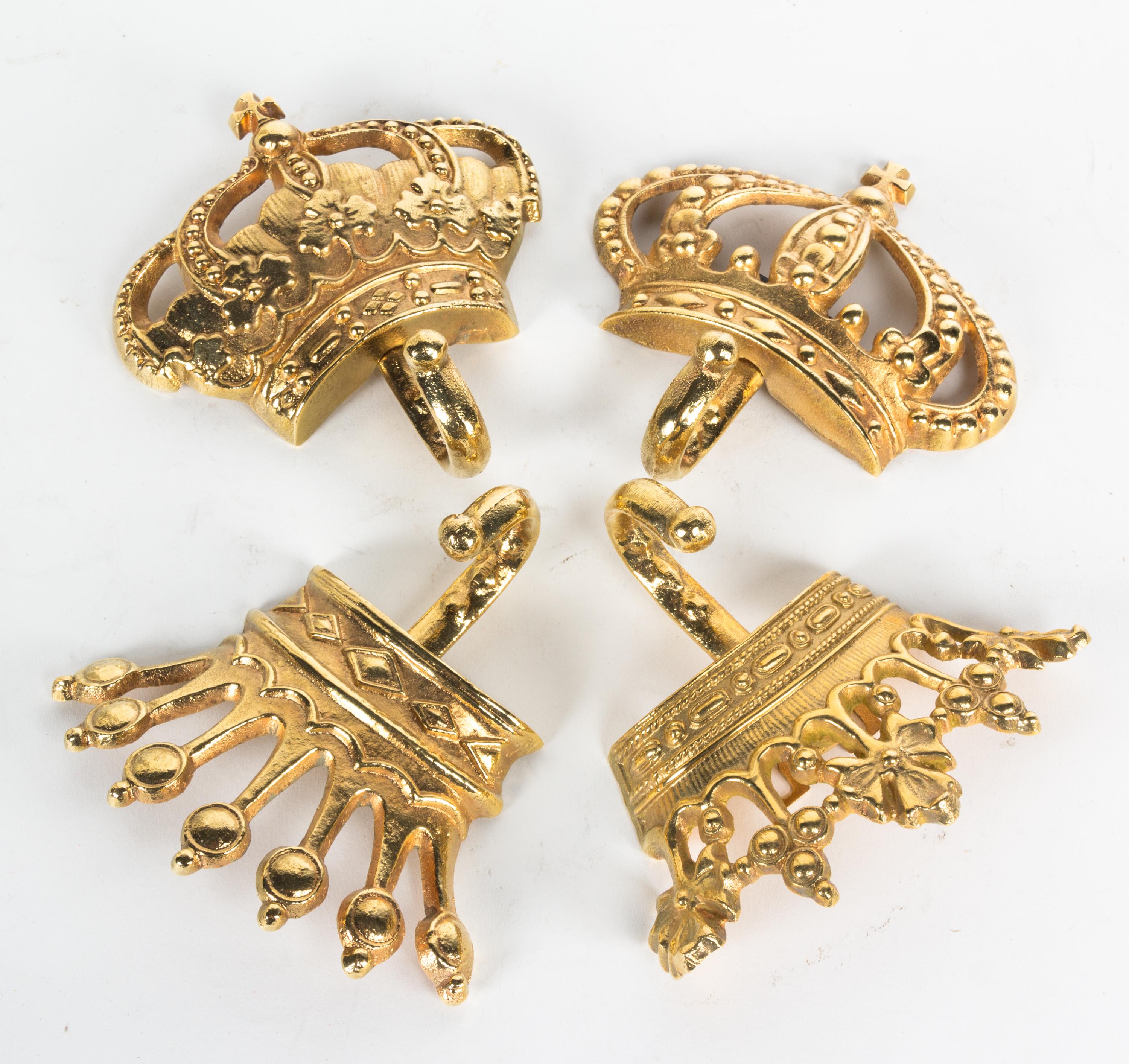 A Set of Four Crown-Shaped Wall Hooks Dimensions of widest 5 1/2 inches. — 20TH CENTURY