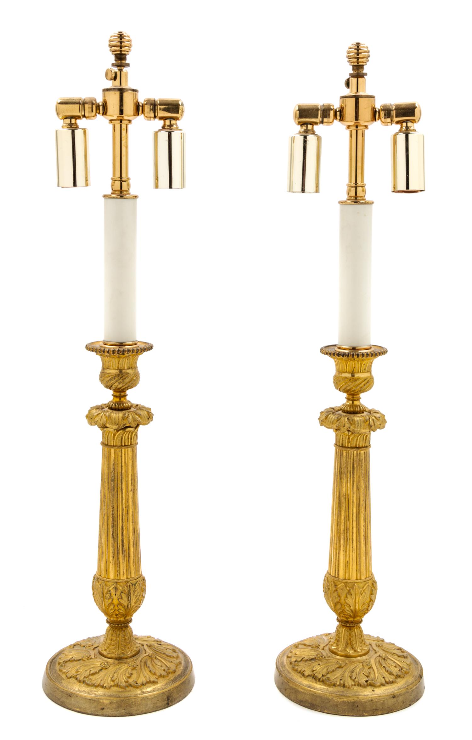 A Pair of Empire Gilt Bronze Candlesticks Height 21 inches. — CIRCA 1835