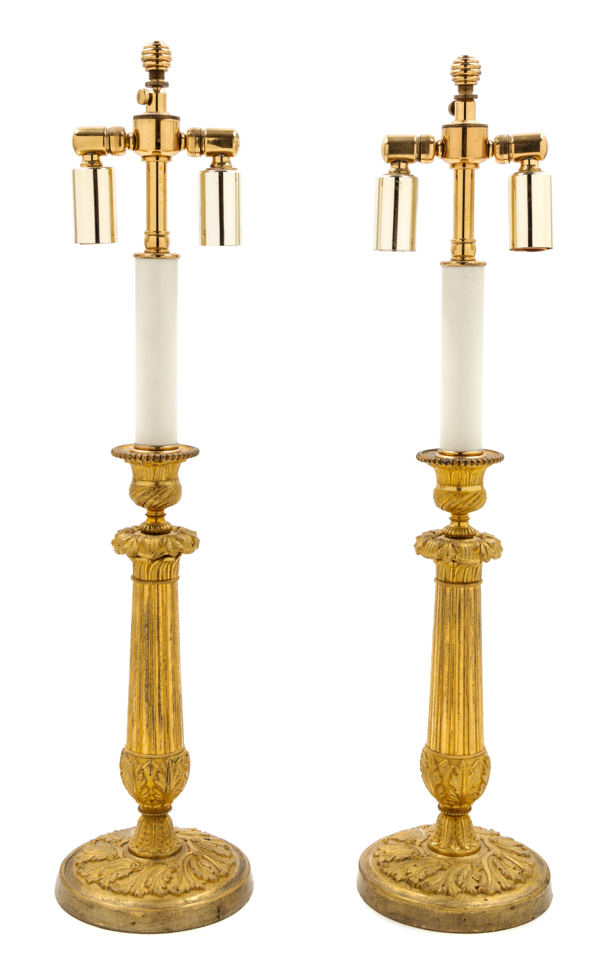 A Pair of Empire Gilt Bronze Candlesticks Height 21 inches. — CIRCA 1835