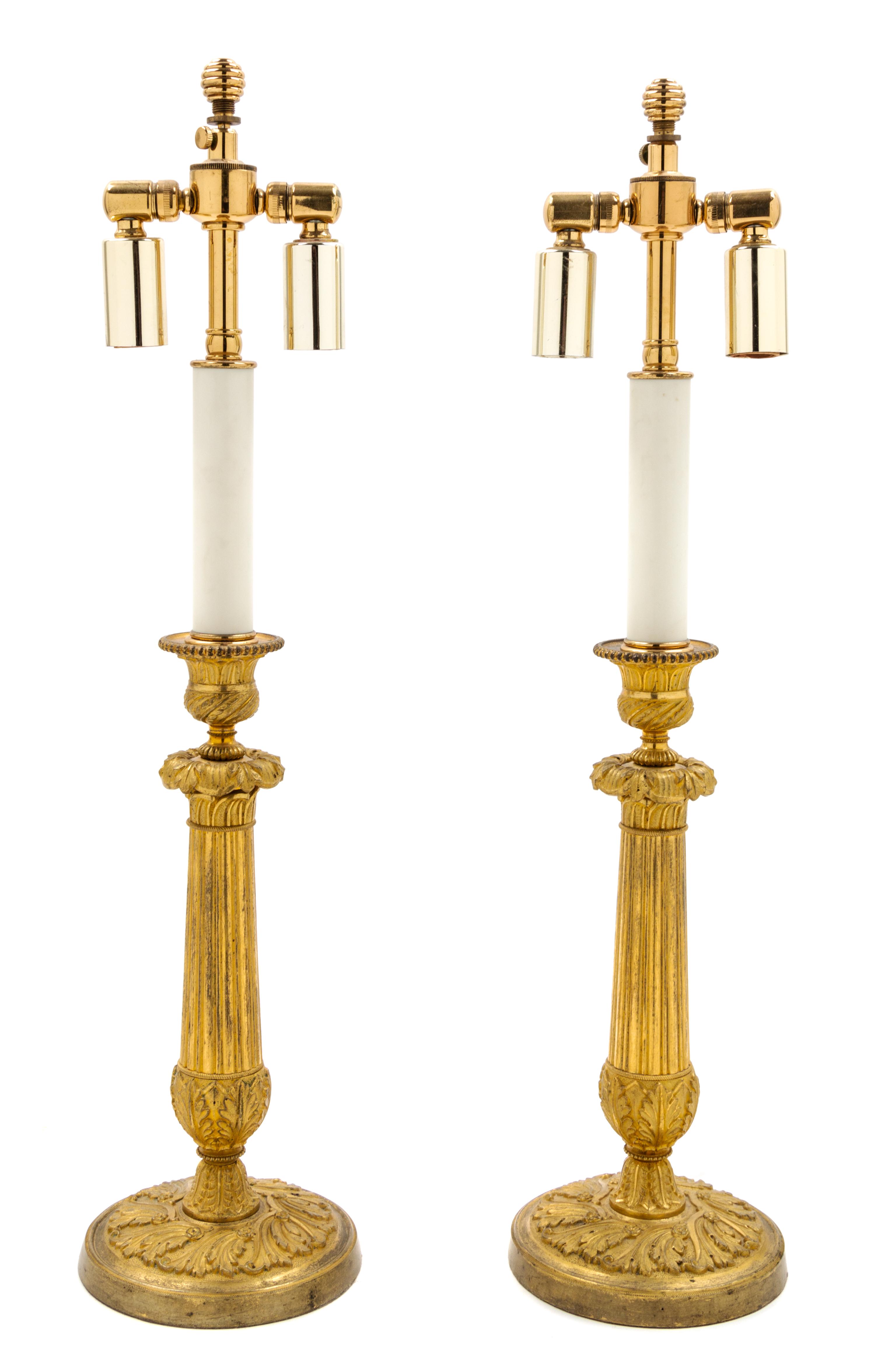 A Pair of Empire Gilt Bronze Candlesticks Height 21 inches. — CIRCA 1835