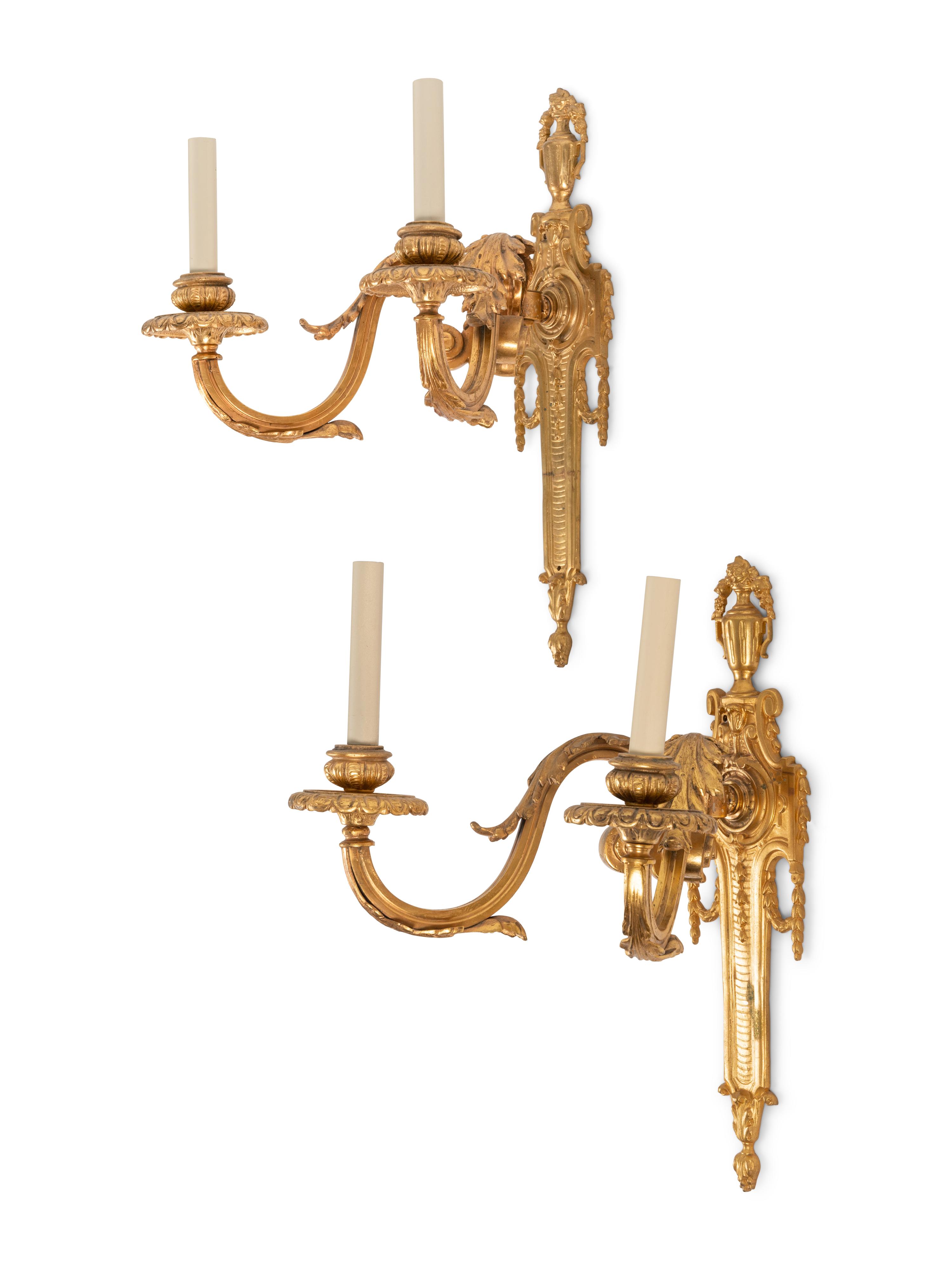 A Pair of Louis XVI Style Gilt Bronze Two-Light Sconces