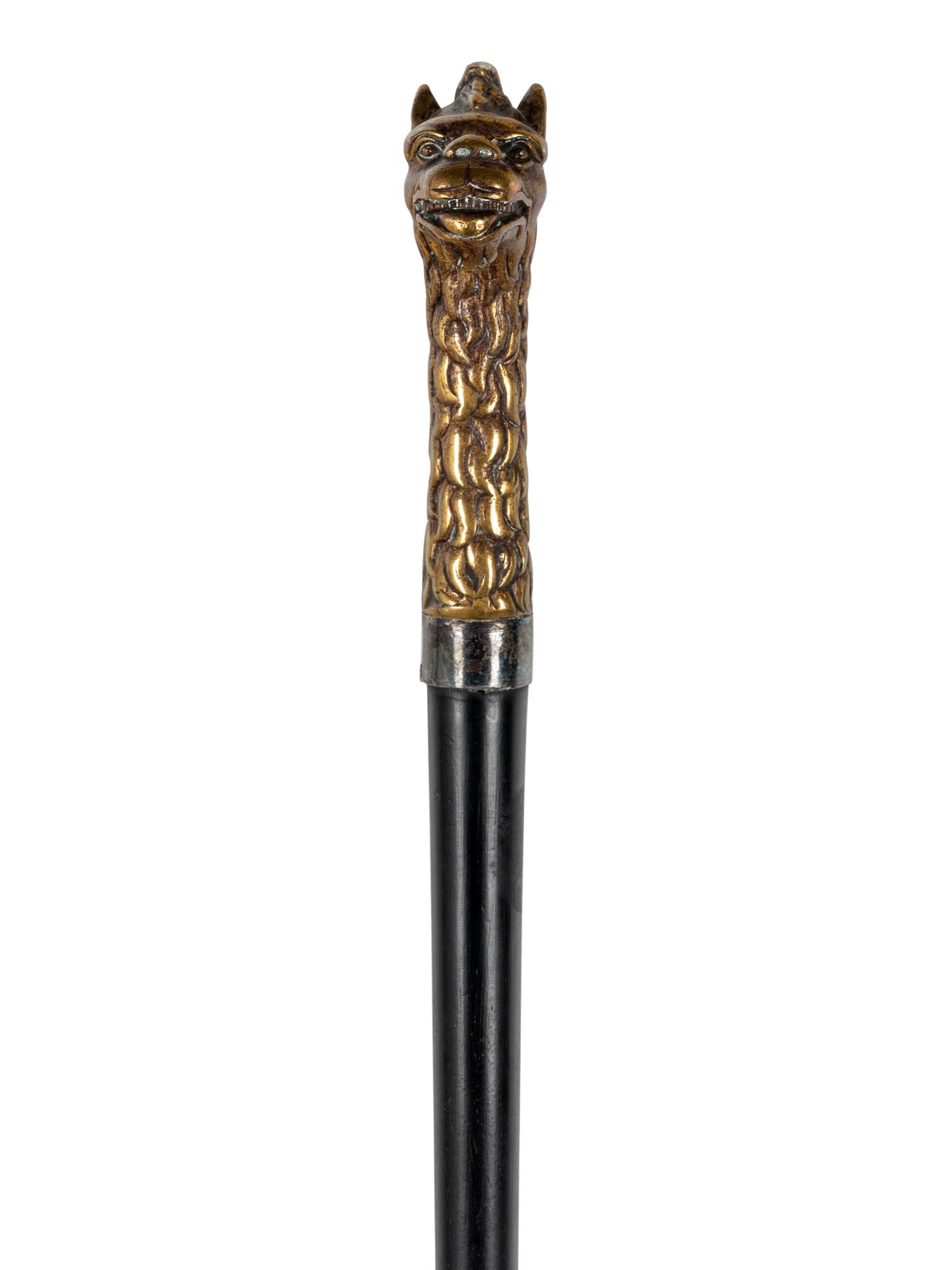 Two Figural Walking Sticks or Canes
