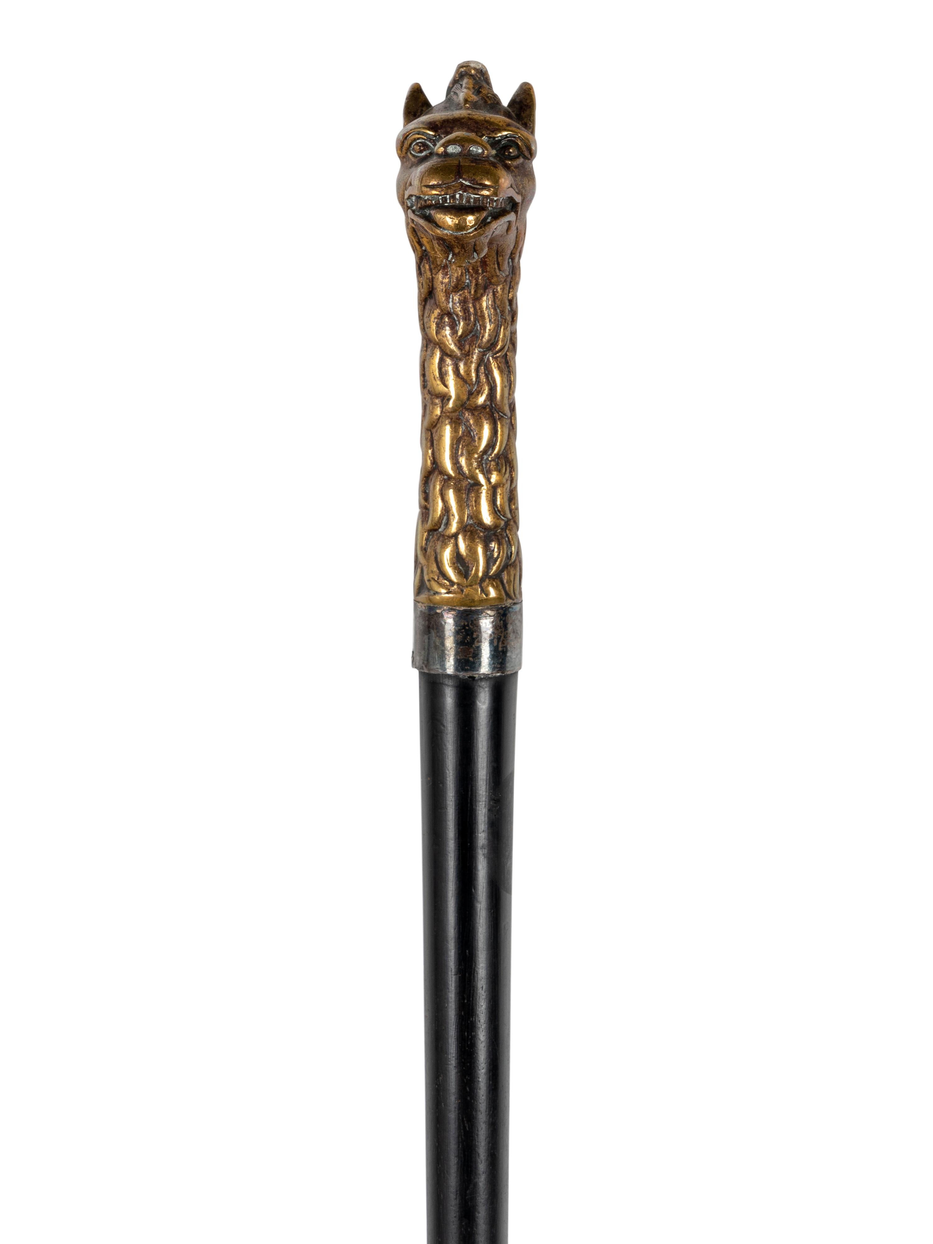 Two Figural Walking Sticks or Canes