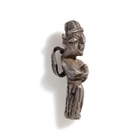 A Phoenician Silver Pendant of a Deity
