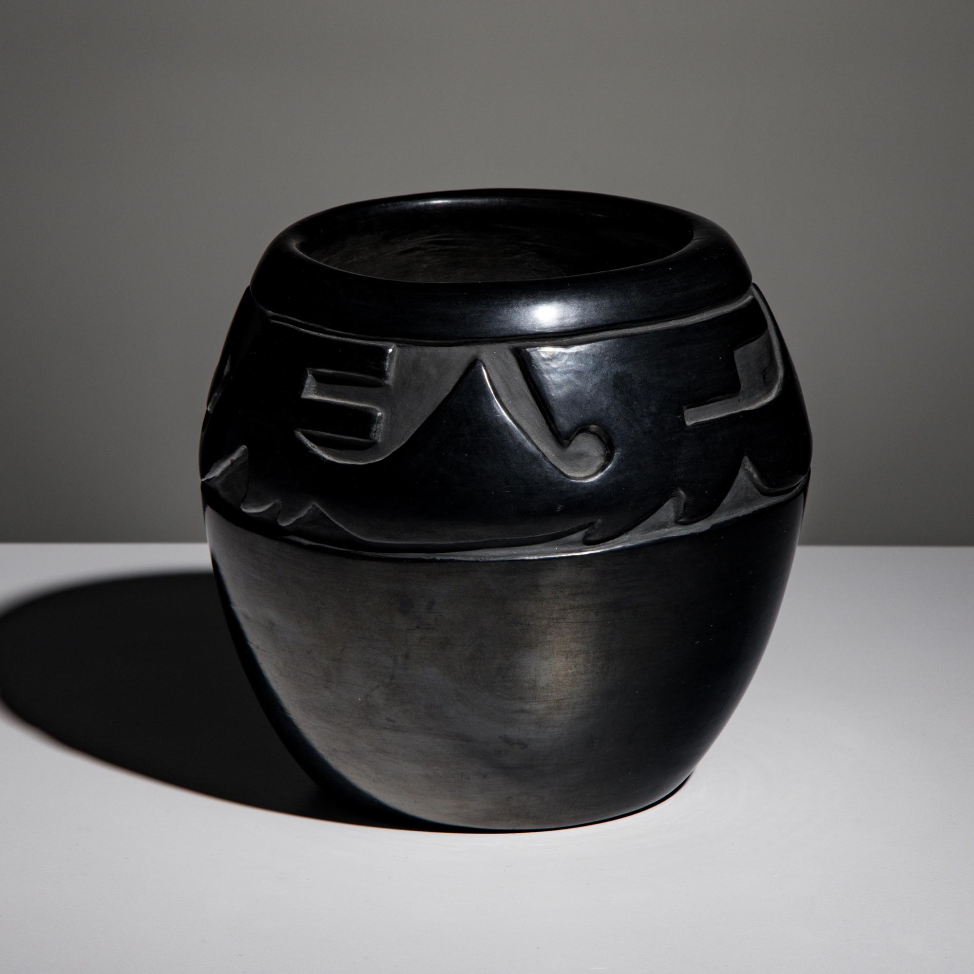 Toni Roller (Santa Clara, b. 1935) — Carved Blackware Pottery Jar, Avanyu