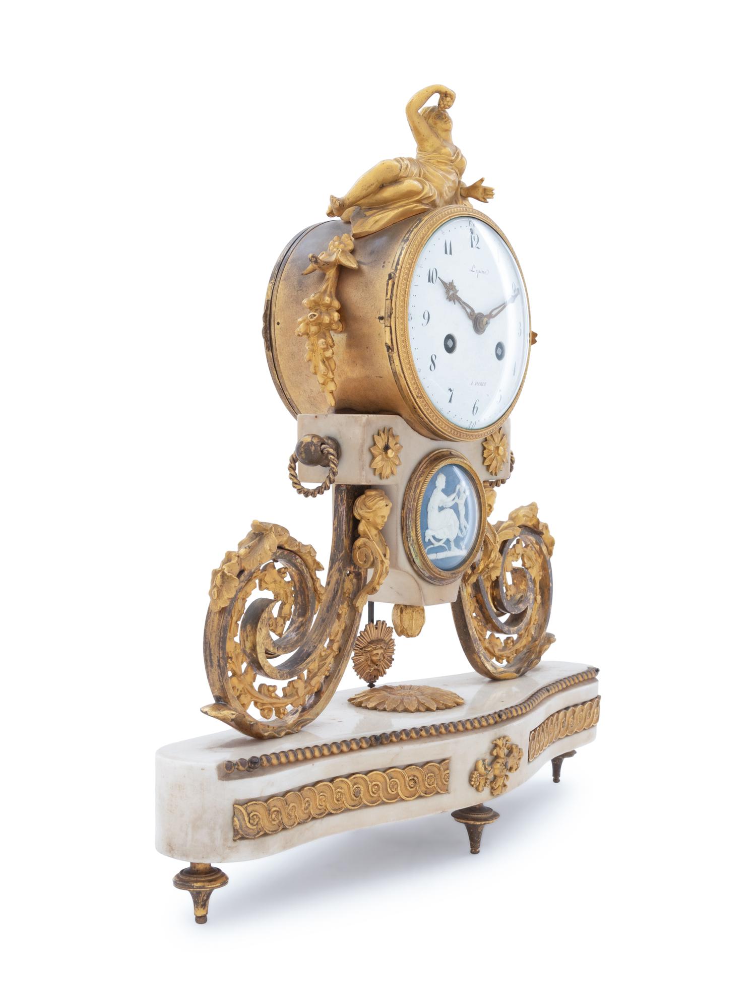 A French Gilt Bronze and Blue Jasperware Mounted Mantel Clock
