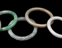 Five Chinese Jadeite and Glass Bracelets