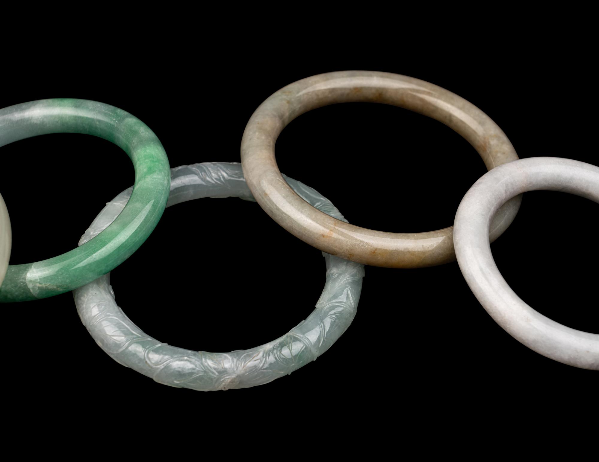 Five Chinese Jadeite and Glass Bracelets