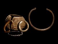 Five African Metalwork Currency Bracelets