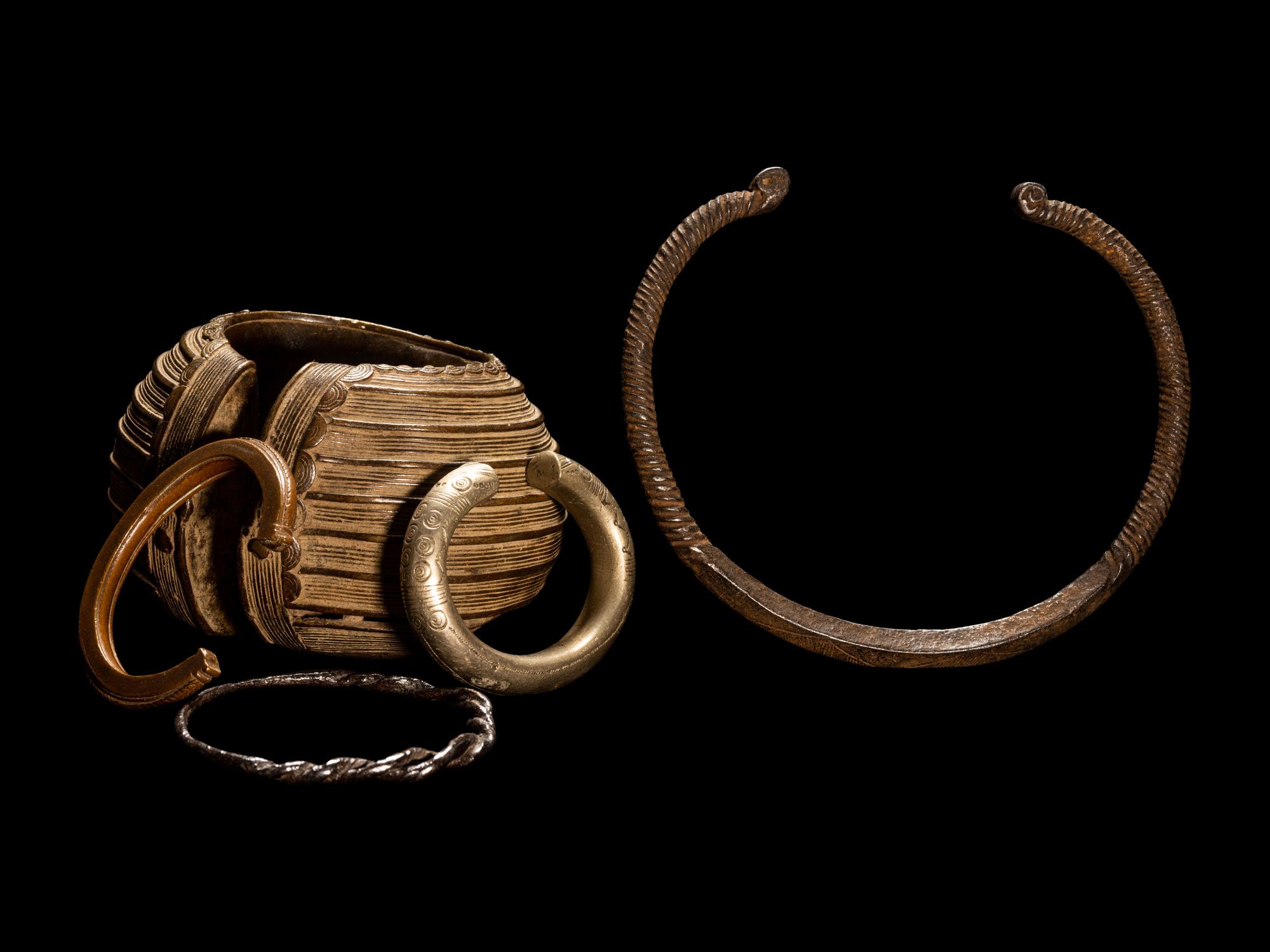 Five African Metalwork Currency Bracelets