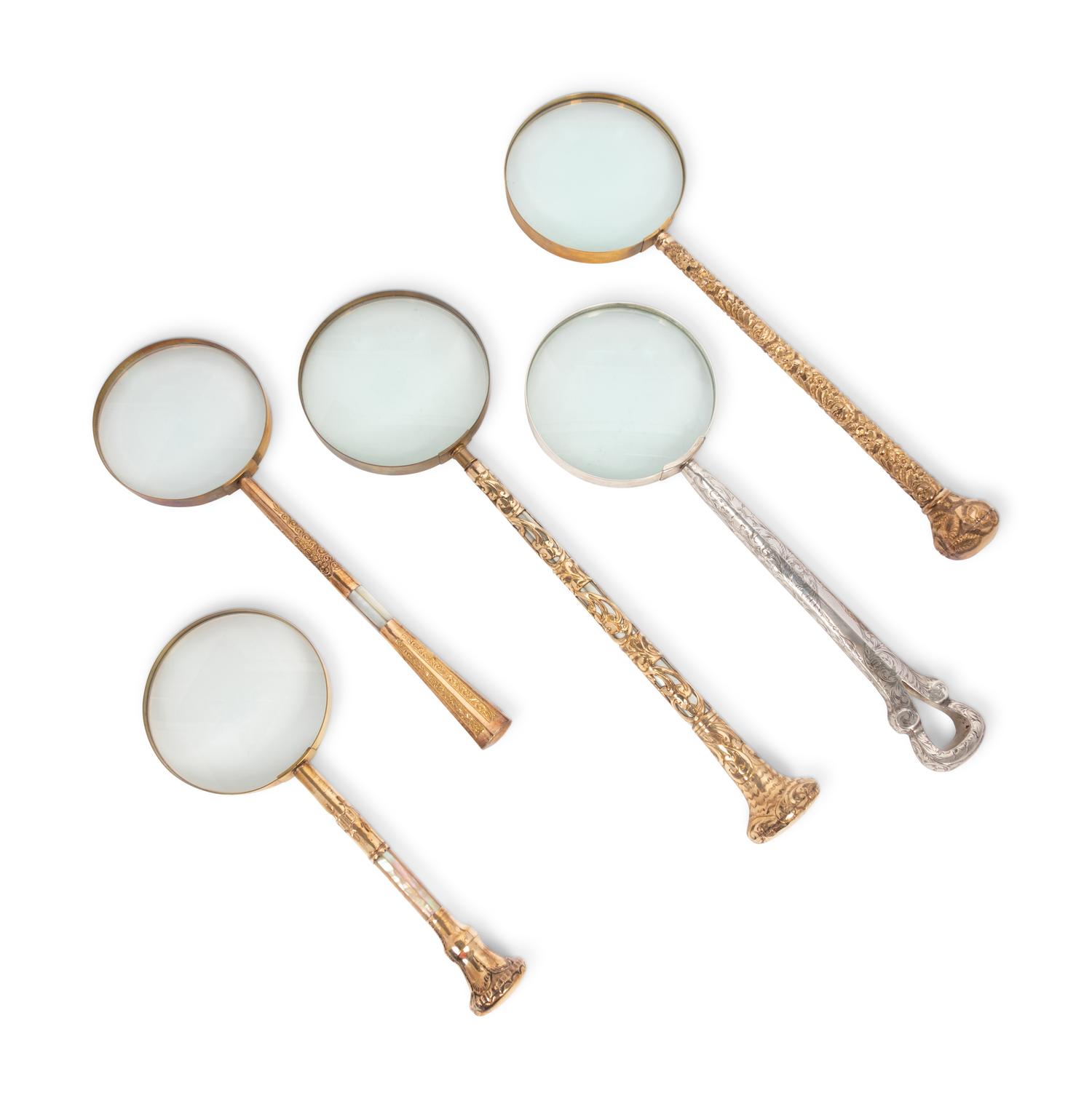 A Group of Five Victorian Parasol Handles Converted to Magnifying Glasses