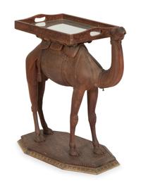 An Anglo-Indian Carved Wood Camel-Form Side Table