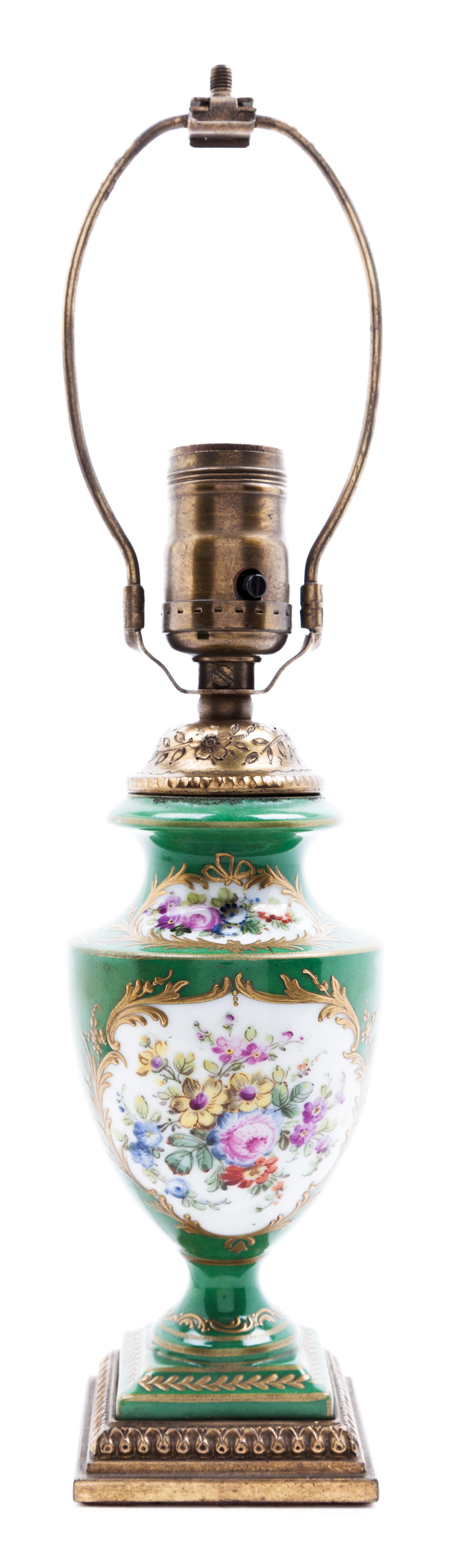 A Continental Porcelain Vase Height overall 14 1/2 inches.