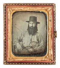 [MINING - EARLY PHOTOGRAPHY]. Sixth plate daguerreotype of a possible gold miner wearing a 2-piece Mexican War-era military belt.