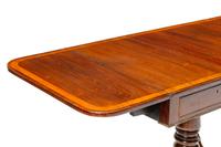 A Regency Gilt Bronze Mounted Satinwood-Banded Mahogany Sofa Table