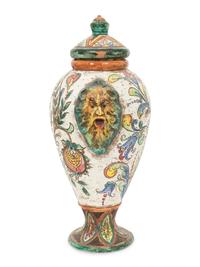 An Italian Majolica Covered Urn with Lion Mask Handles