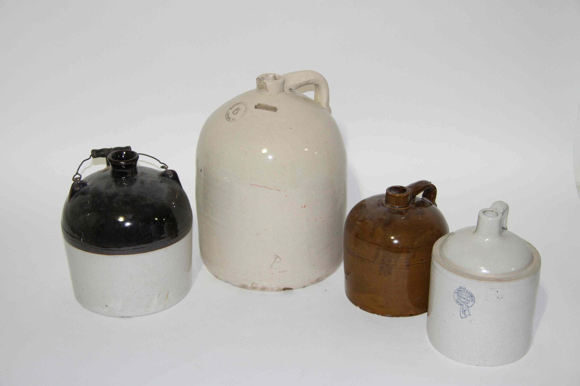 A Group of Seven Pottery Stoneware Articles Height of tallest 18 1/2 inches.