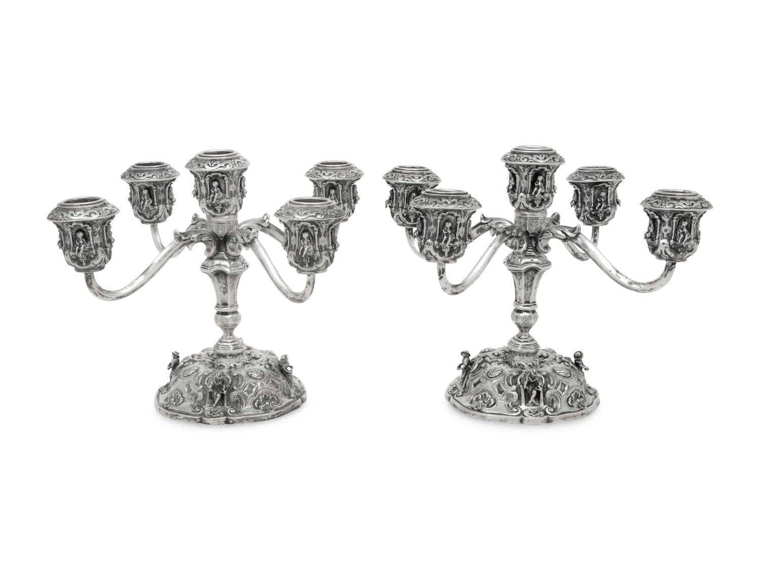 A Pair of German Silver Five-Light Candelabra