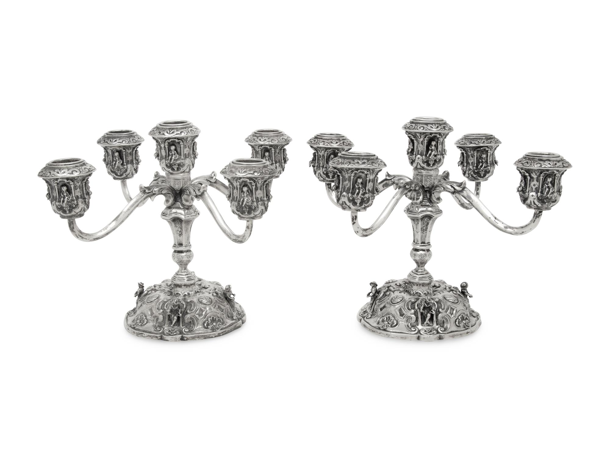 A Pair of German Silver Five-Light Candelabra