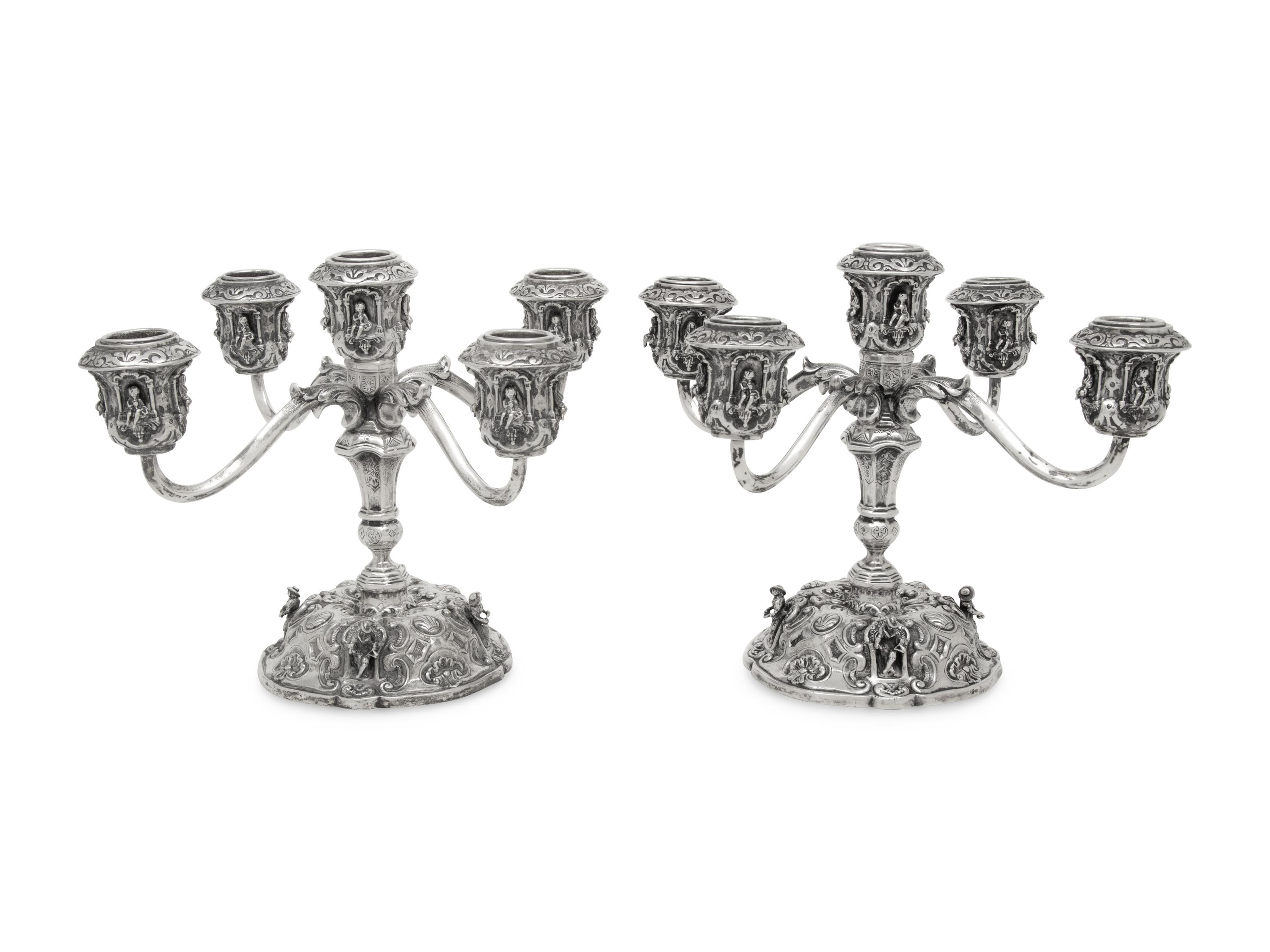 A Pair of German Silver Five-Light Candelabra