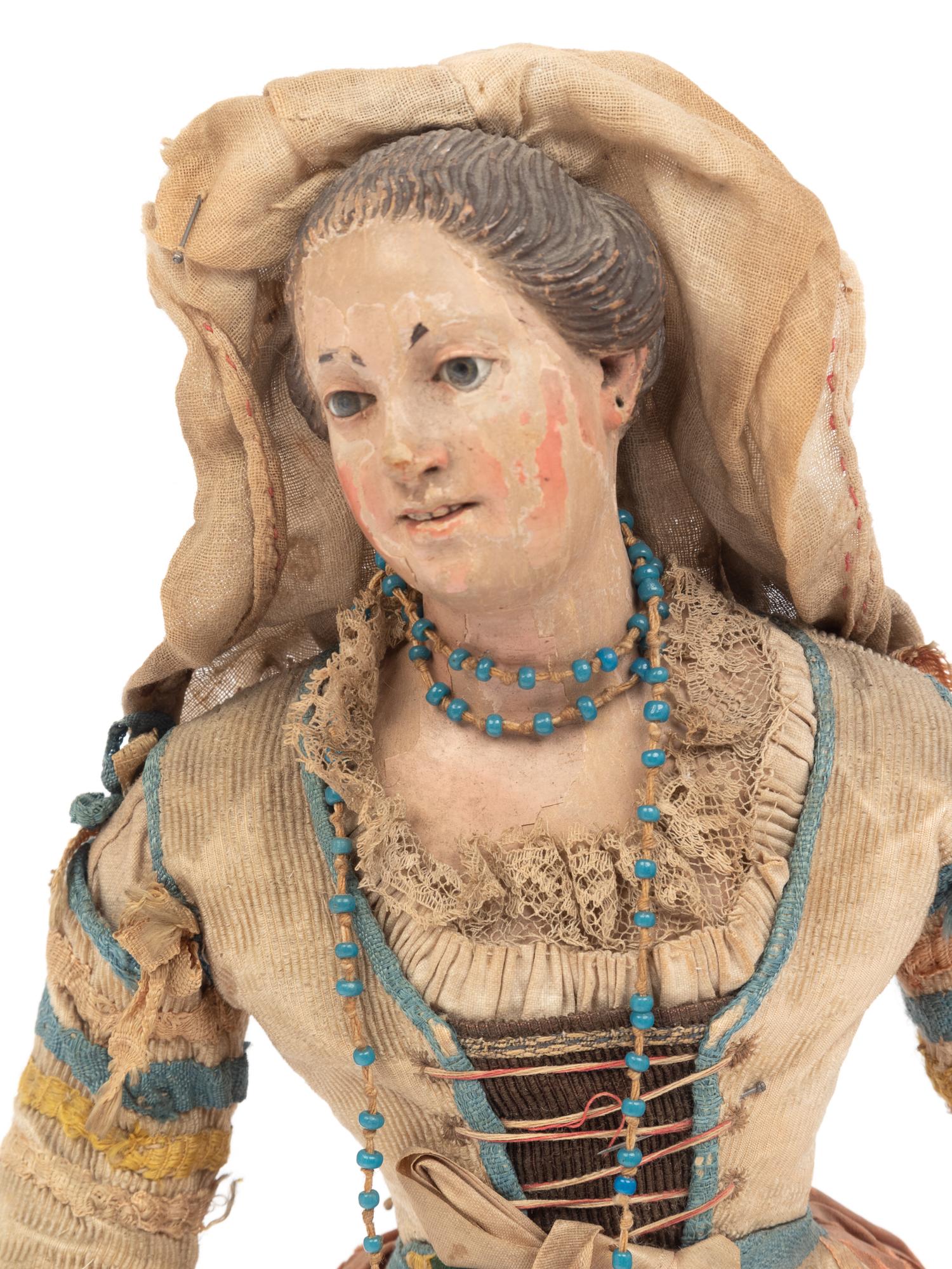Three Italian Carved and Polychromed Wood and Gesso Crèche Figures