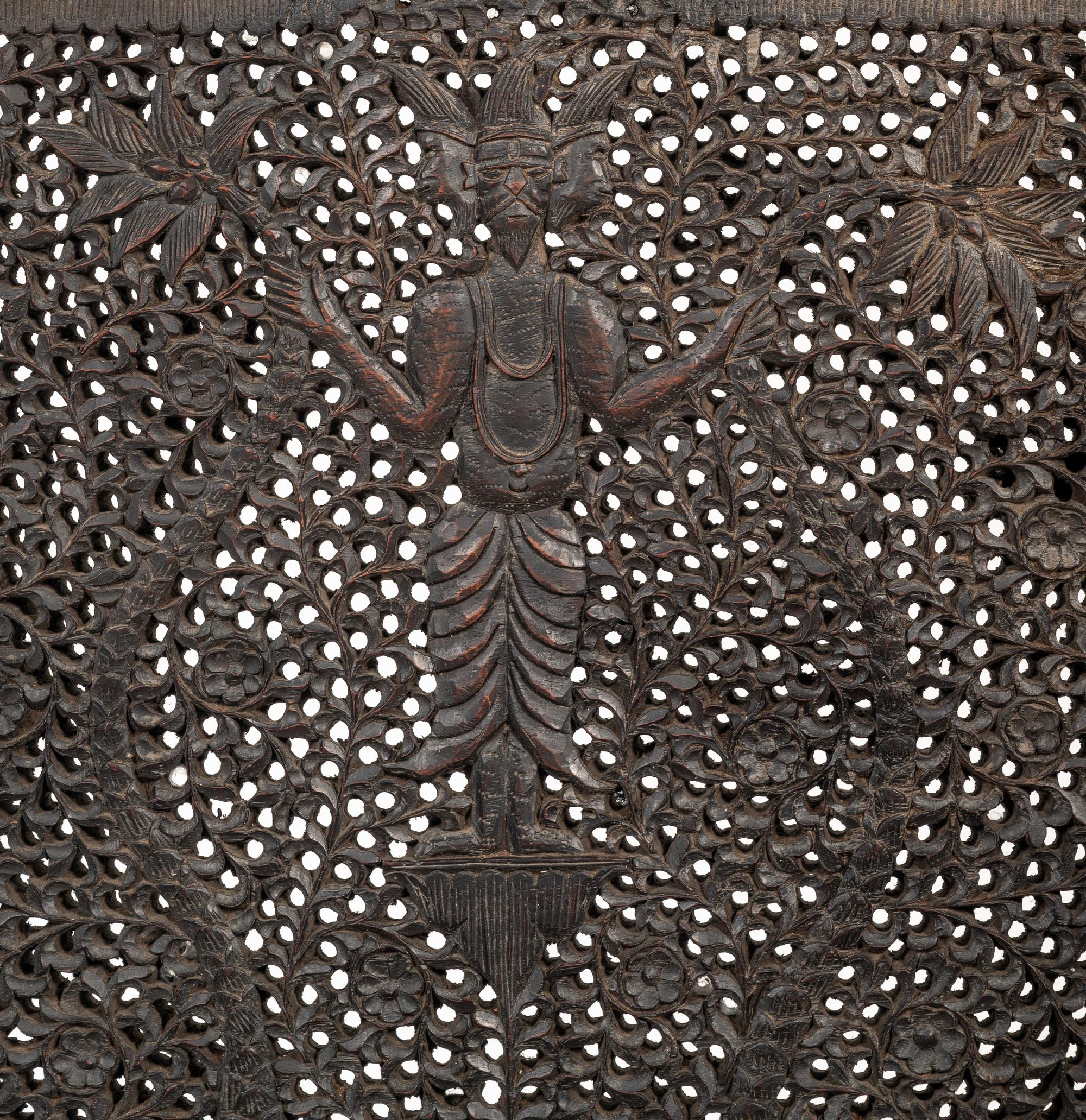 A Burmese Carved Hardwood Armchair