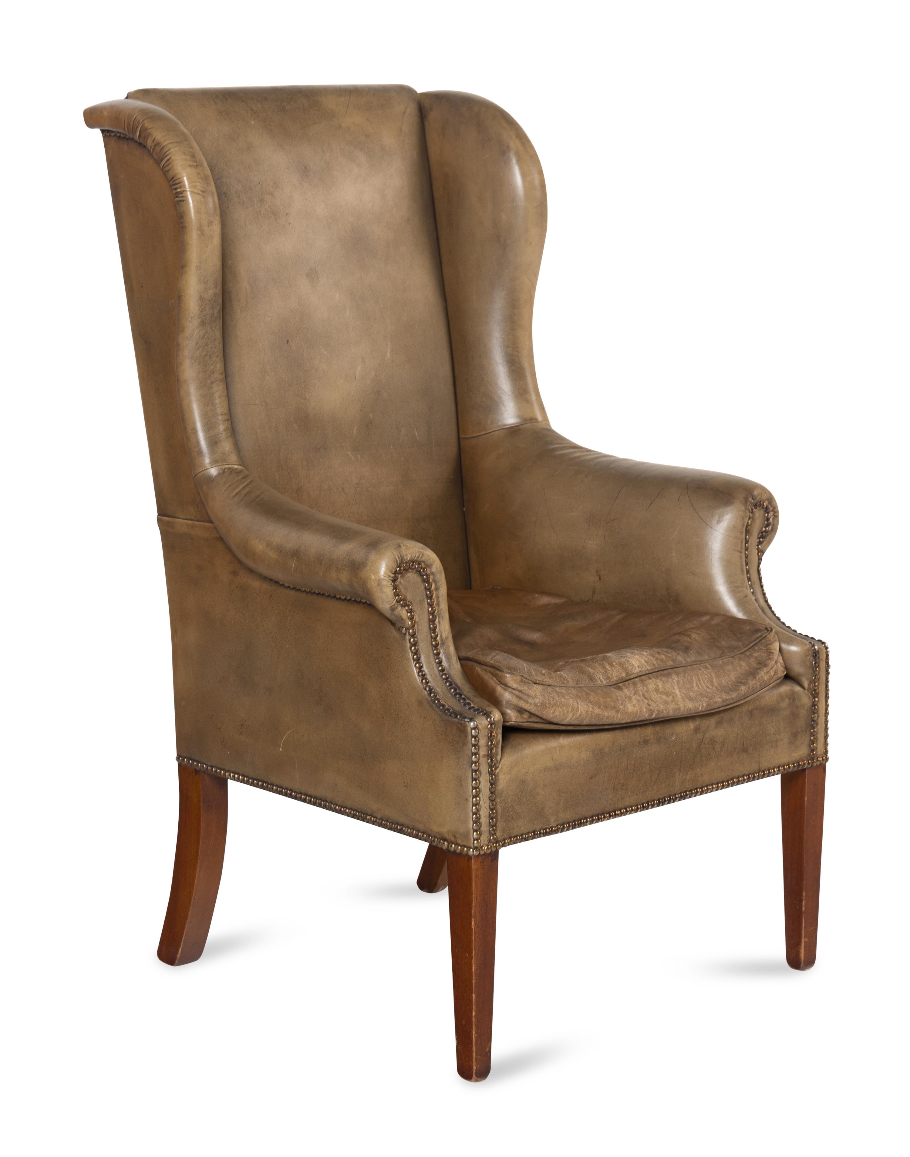 An English Mahogany Leather-Upholstered Wingback Armchair
