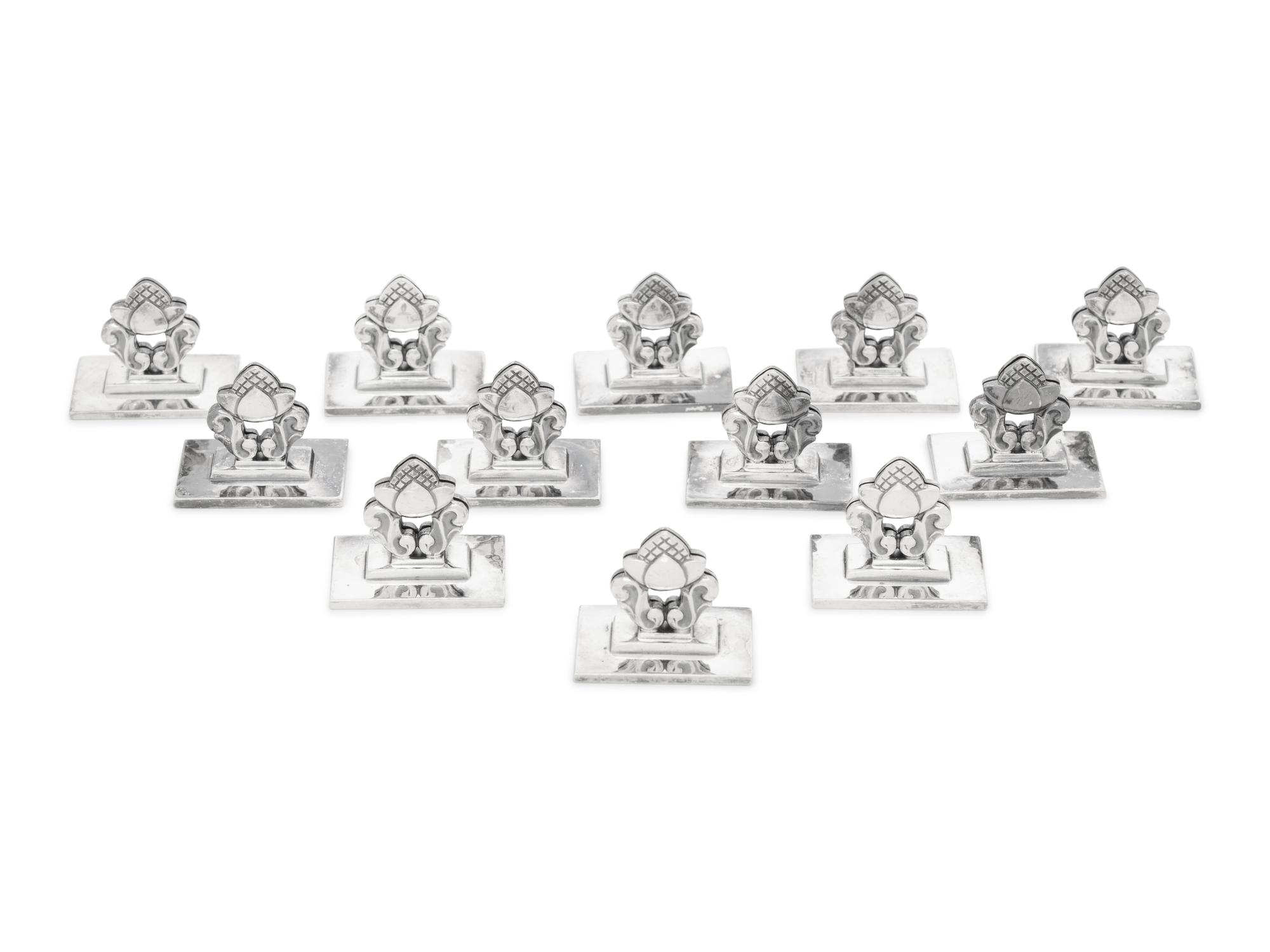 A Set of Twelve Georg Jensen Silver Acorn Place Card Holders